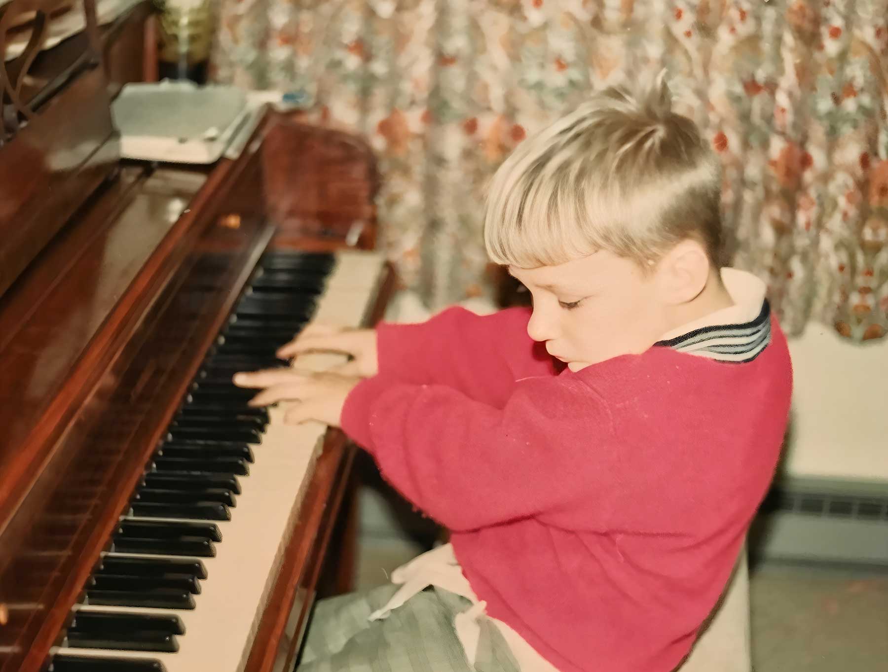 Young Nicholas Pavkovic at the piano